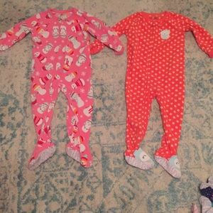 Two 2t  Carters footie pajamas